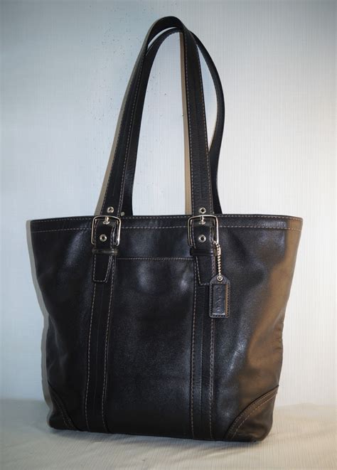 Our upcrafted handbags have been cleaned, repaired and transformed with clever design details. . Vintage coach tote bag